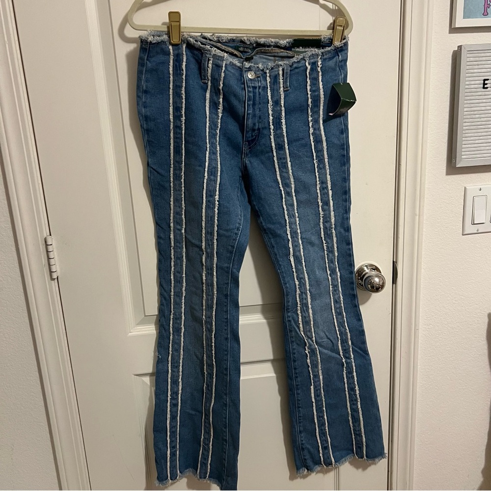 Distressed flare low waist jeans